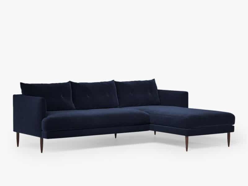 Dark blue velvet upholstered chaise-end sofa