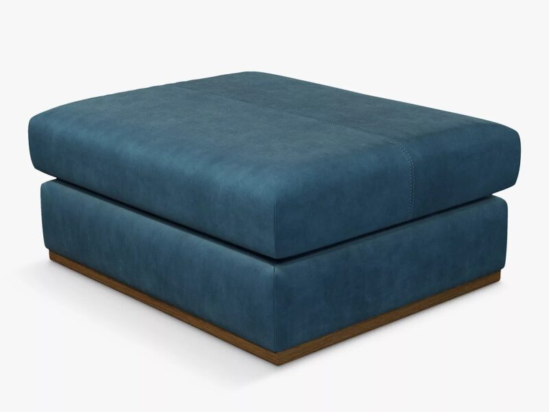 Blue velvet upholstered footstool