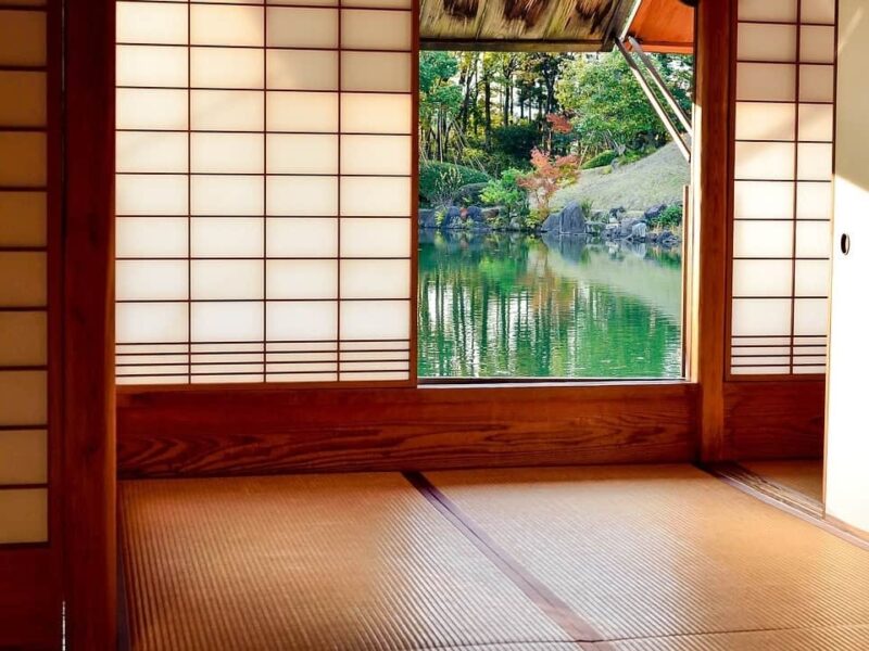 Garden room looking out onto a decorative pond area