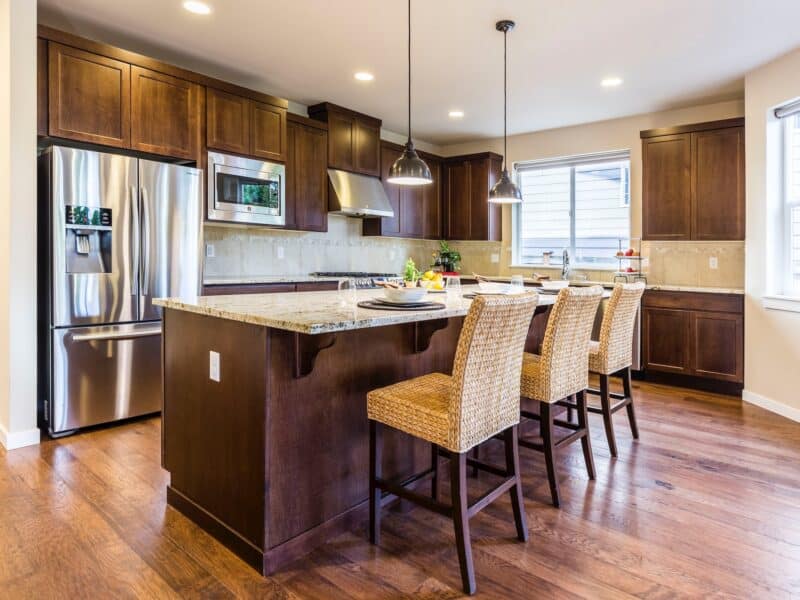 Kitchen with dark wood flooring