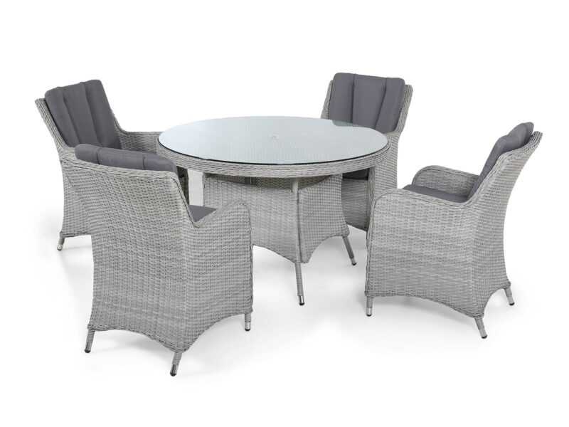 Round rattan dining table with glass top and 4 woven rattan dining armchairs