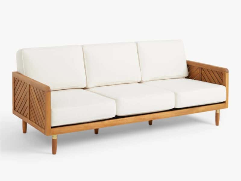 Teak 3-seater sofa with cream fabric covered cushions