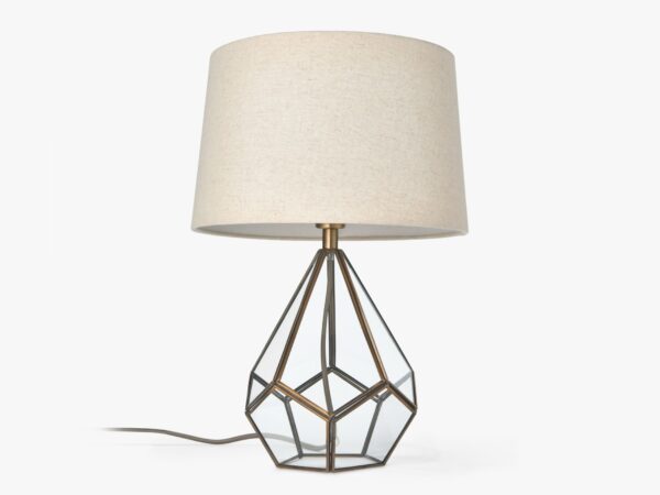 Table lamp with glass and brass base