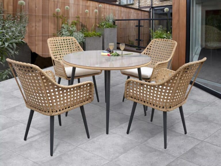 Outdoor dining table and 4 woven rattan chairs