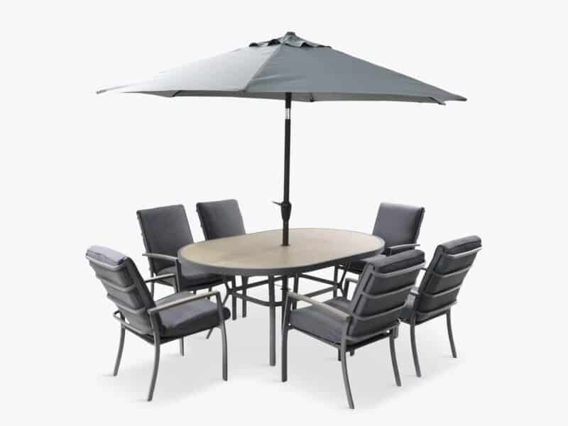 Outdoor oval-shaped dining table, 6 grey dining chairs and a grey parasol