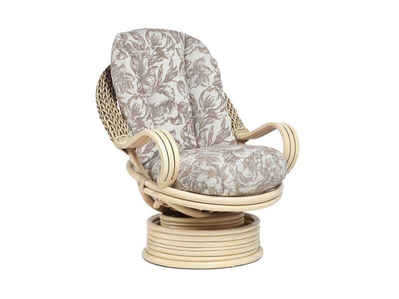 Cane rocking chair with floral fabric covered cushions