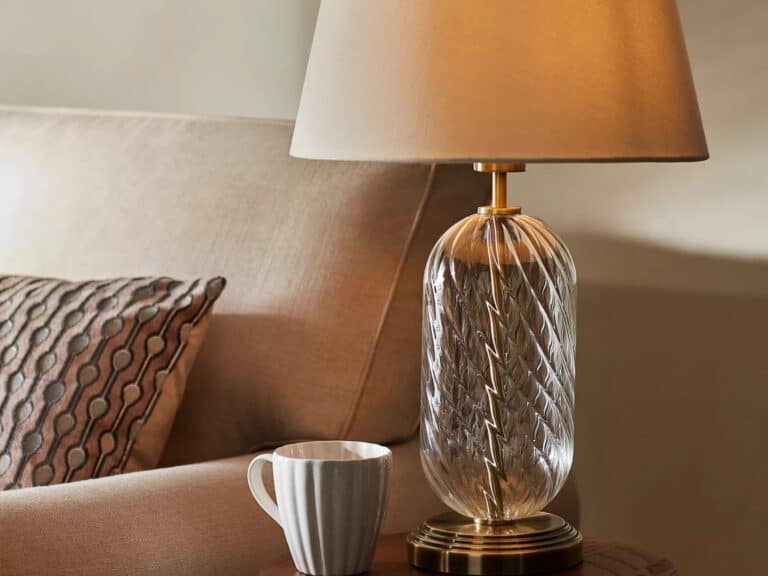 Round glass table lamp with brass base