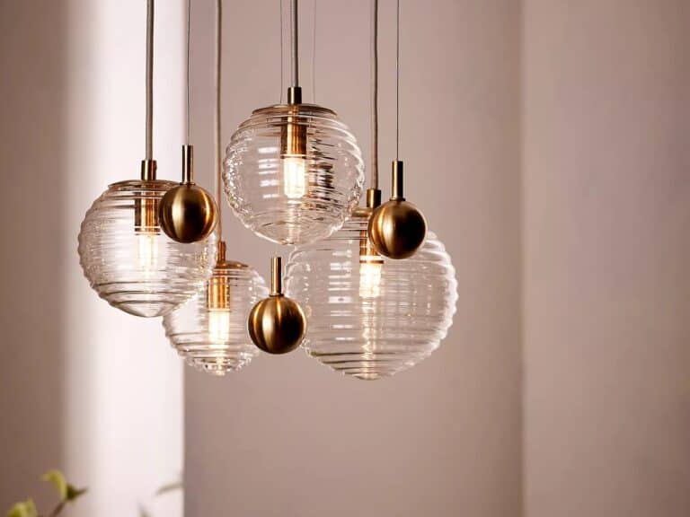 Ceiling lights with spherical glass pendants featuring a rippled surface