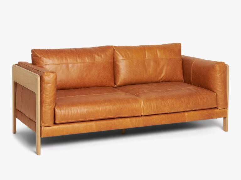 2-seater tan leather sofa with wooden frame