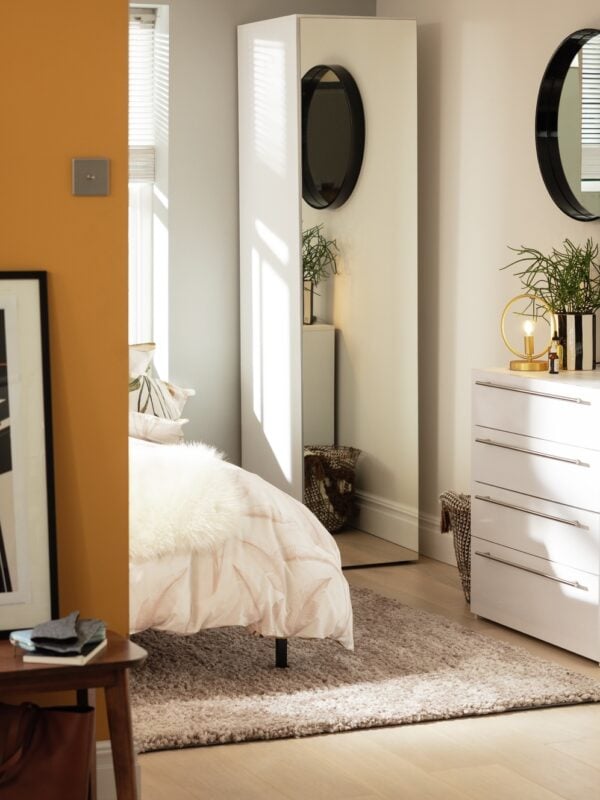 Tall white single wardrobe with mirrored door