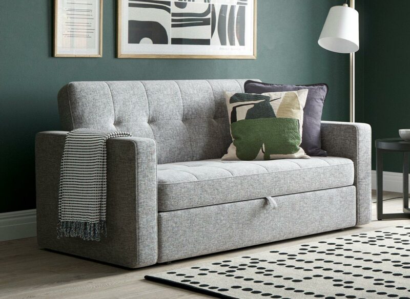 Grey fabric upholstered sofa bed