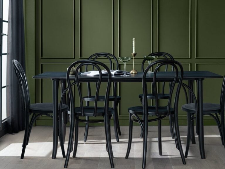 Black dining table and 6 black chairs