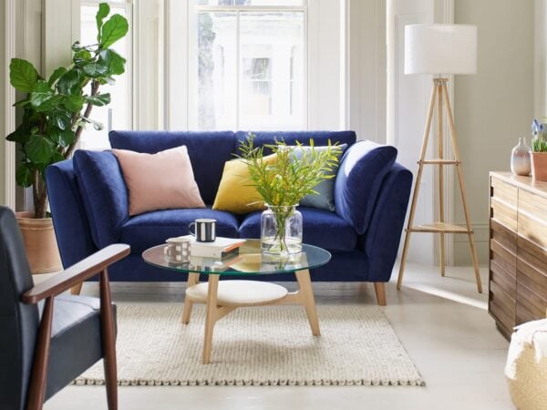 Tripod lamp in a living room setting
