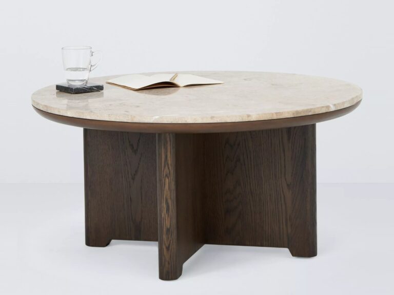 Round dark wood table with a grey marble top