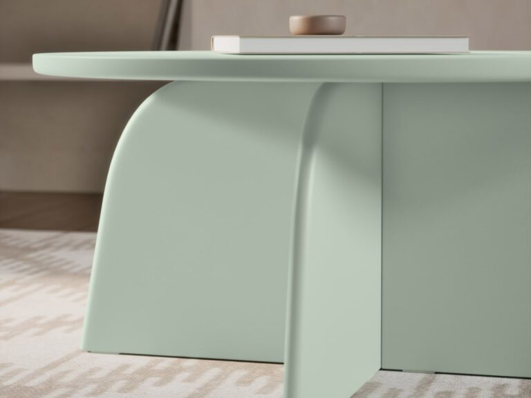 Round pale green coffee table with curved frame