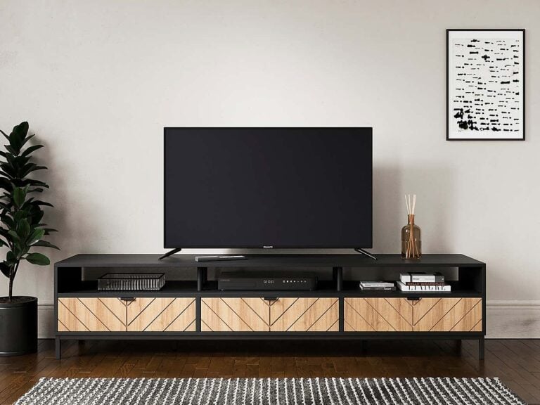 Wide black tv stand with 3 chevron pattern oak drawers