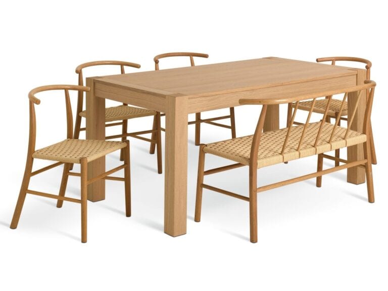 Oak dining table with 4 matching chairs and a bench