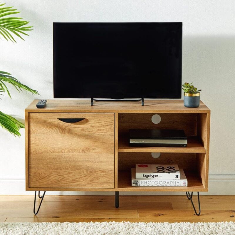 Oak tv unit with two open shelves and drop-down cupboard door