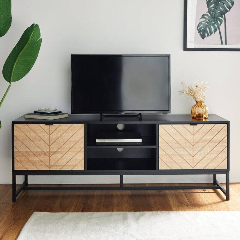 Black frame tv unit with a pair of open shelves and two oak effect chevron pattern doors