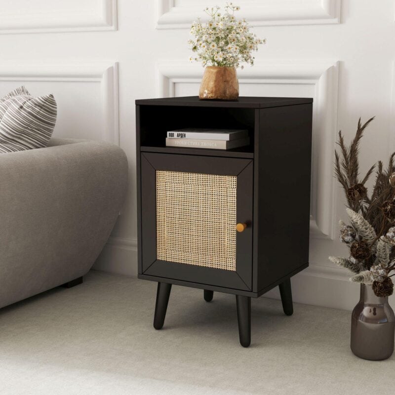 Black bedside table with rattan panel door