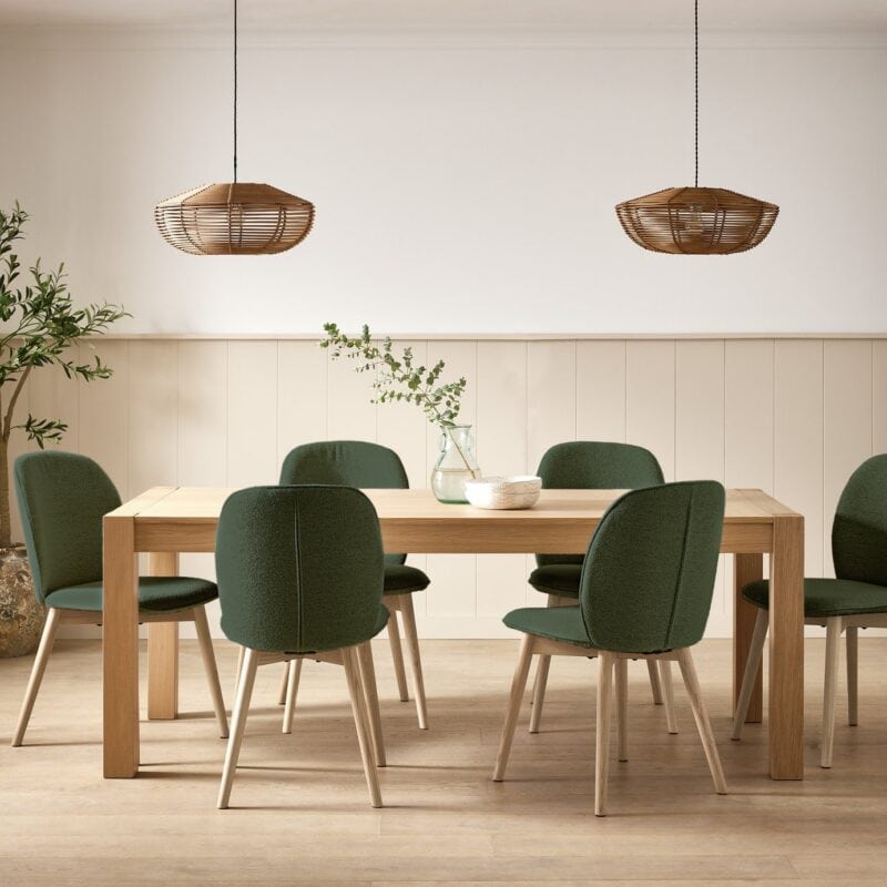 Oak dining table and a set of 6 green fabric chairs