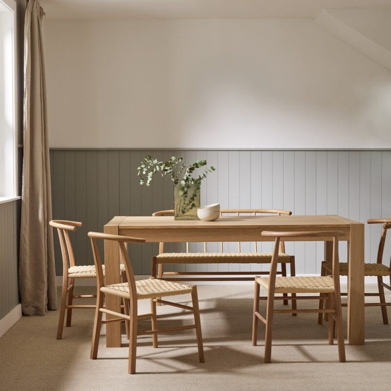 Oak dining table, 4 spindle back chairs and a matching bench