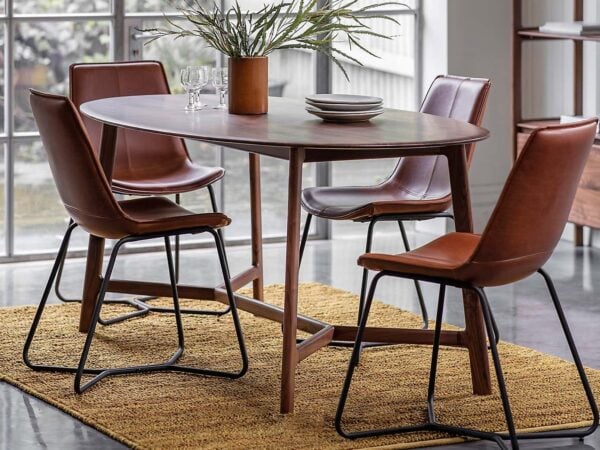 Oval dark wood dining table