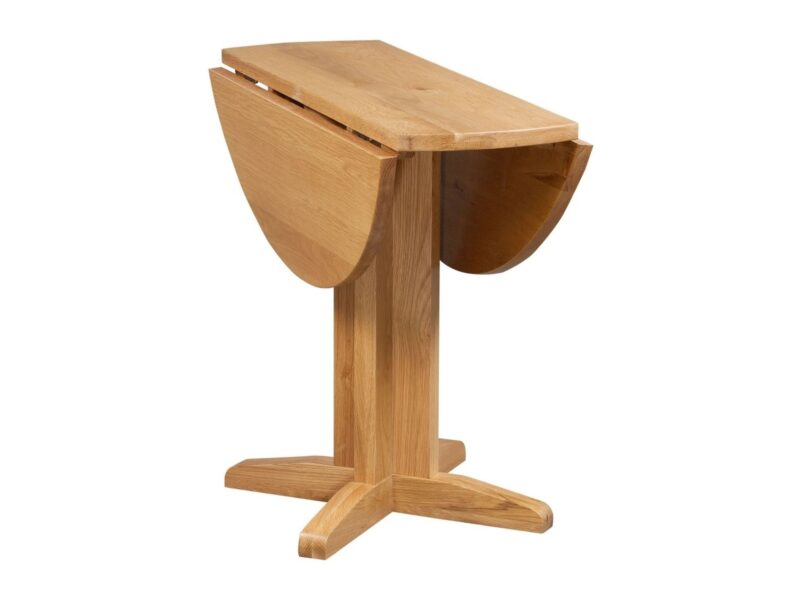 Round oak dining table with drop-leaf top