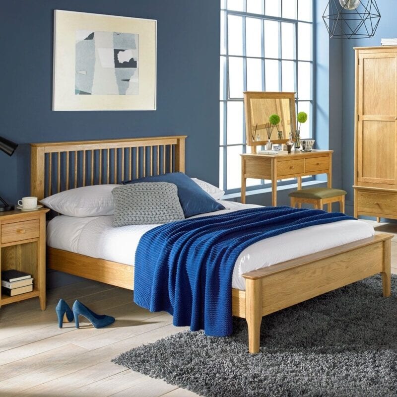 Oak bed frame with spindle headboard