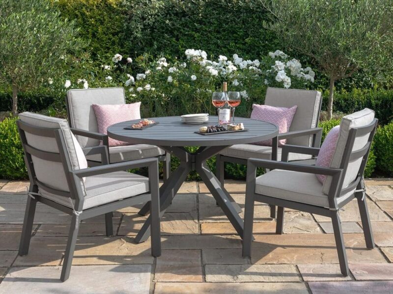 Round grey outdoor dining table and 4 dining chairs