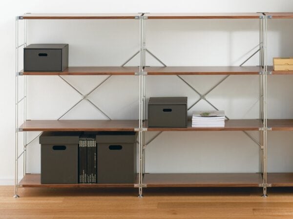 Modular steel shelving with walnut shelves